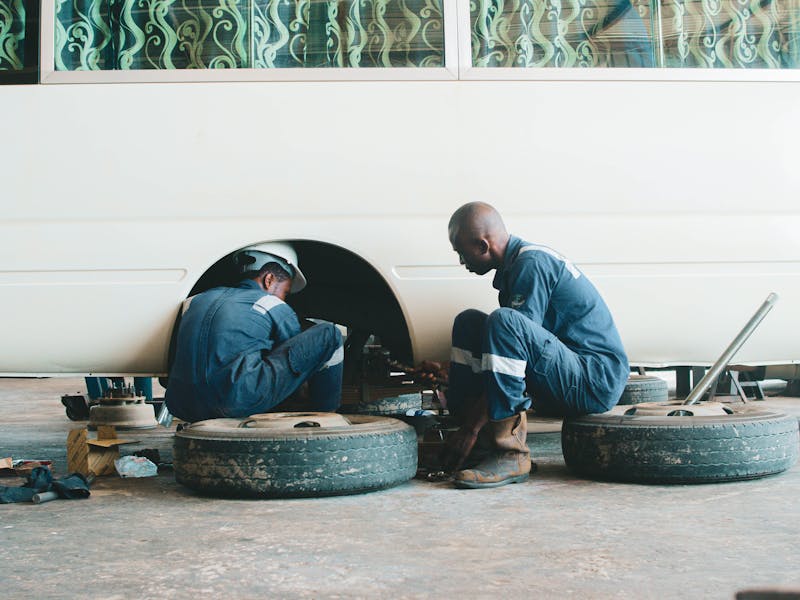 Apex Mobile Tyres technicians fitting a tyre on-site